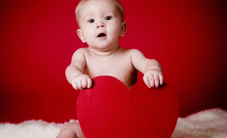 Holidays___Saint_Valentines_Day_Kid_with_a_heart_on_Valentine_s_Day_February_14_061439_